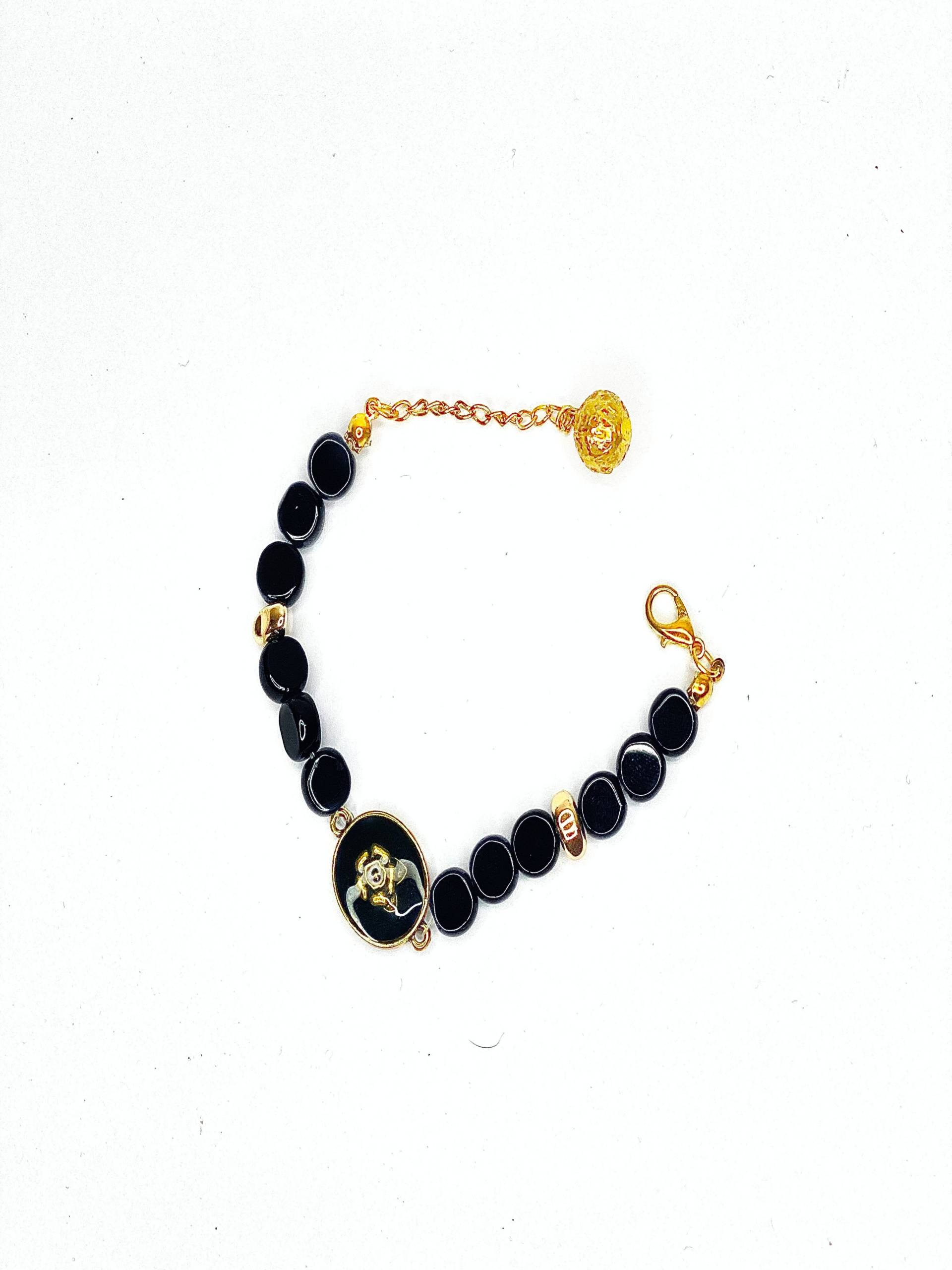 Black Onyx & Gold Charm Bracelet