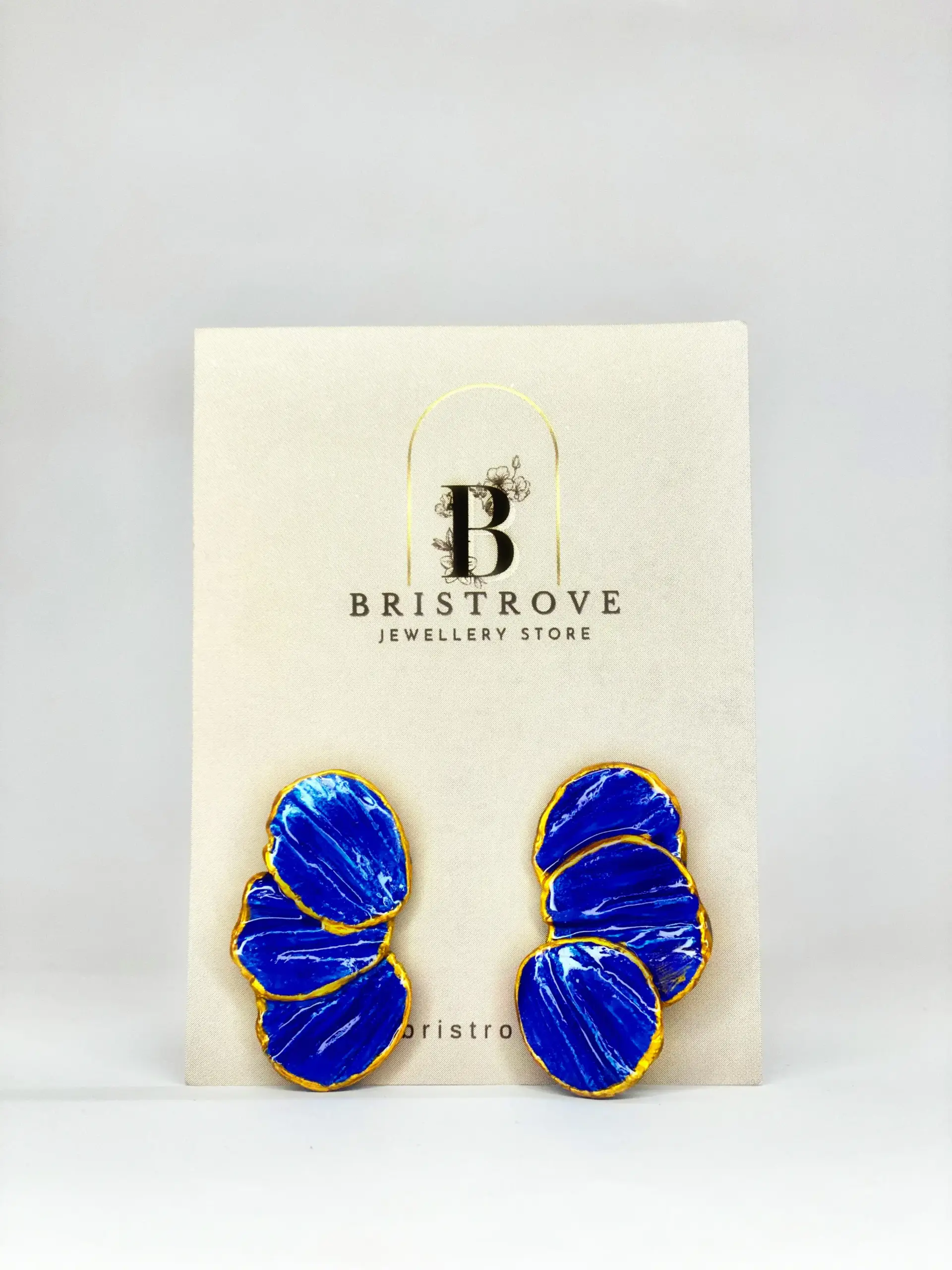 Single blue Ivory Bloom Studs